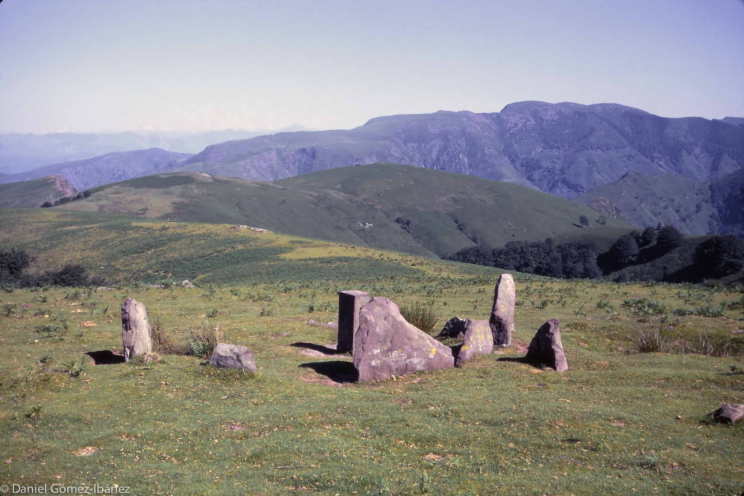 These are summer pastures on the heights between France and Spain: a prehistoric cromlech surrounds a boundary marker on Mt. Artzamendi, near Itxassou [Pyrénées-Atlantiques, France, 1968]