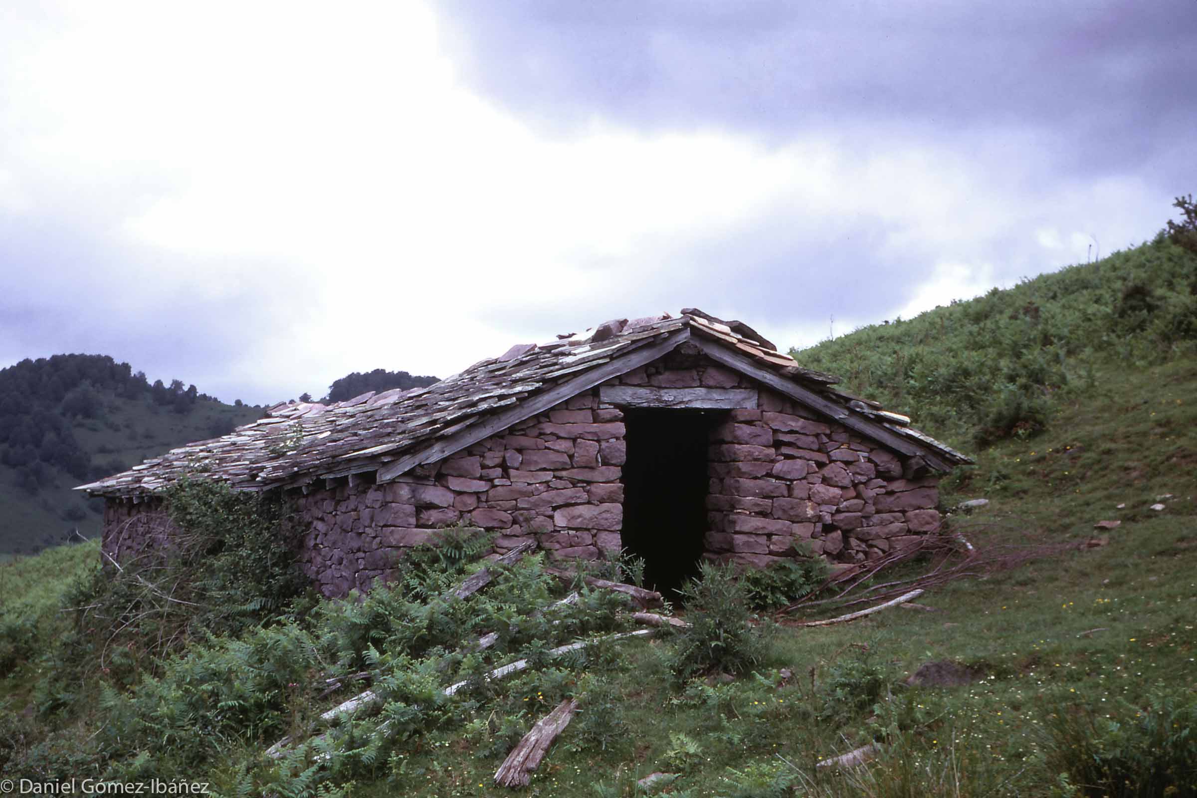 On their mountain pastures, shepherds spend the summers in stone huts like this one, called a borda in Basque. [Baztán valley, Navarra, Spain, 1973]